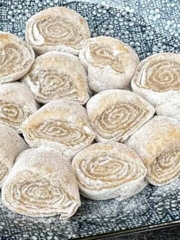 Soft, chewy banana mochi on a blue plate.