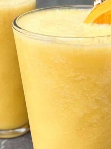 Refreshing orange juice smoothie made with fresh oranges.