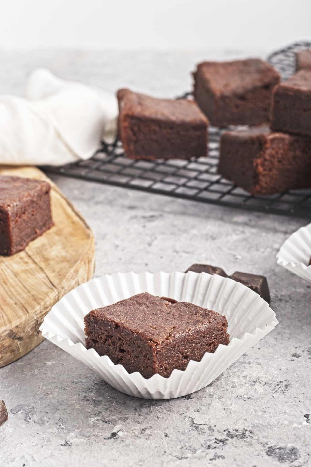 Vegan Chocolate Butter Mochi inside cupcake liner.