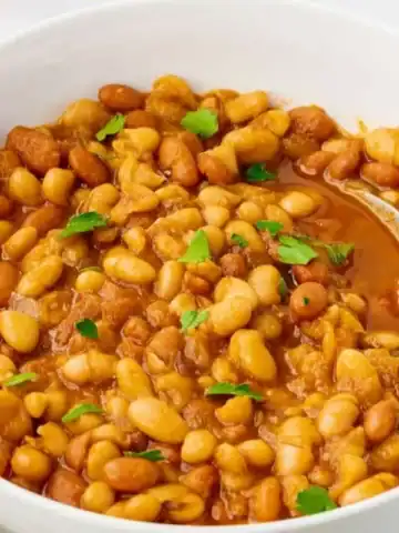 Instant Pot baked beans coated in thick sauce.