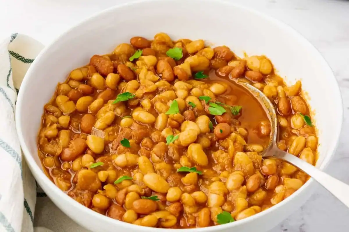 Instant Pot baked beans coated in thick sauce.