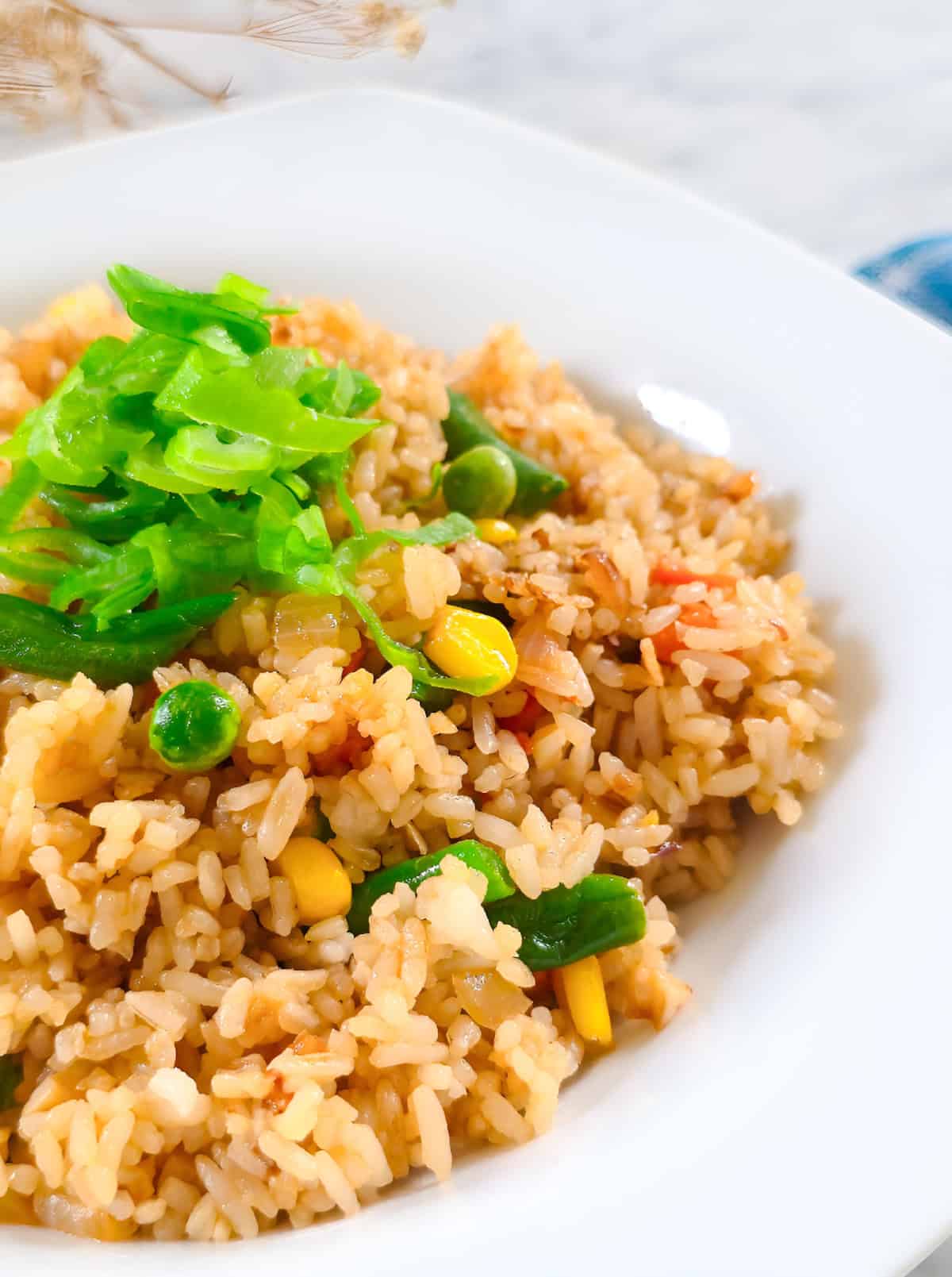 Easy frozen vegetable fried rice served warm with colorful mixed vegetables.