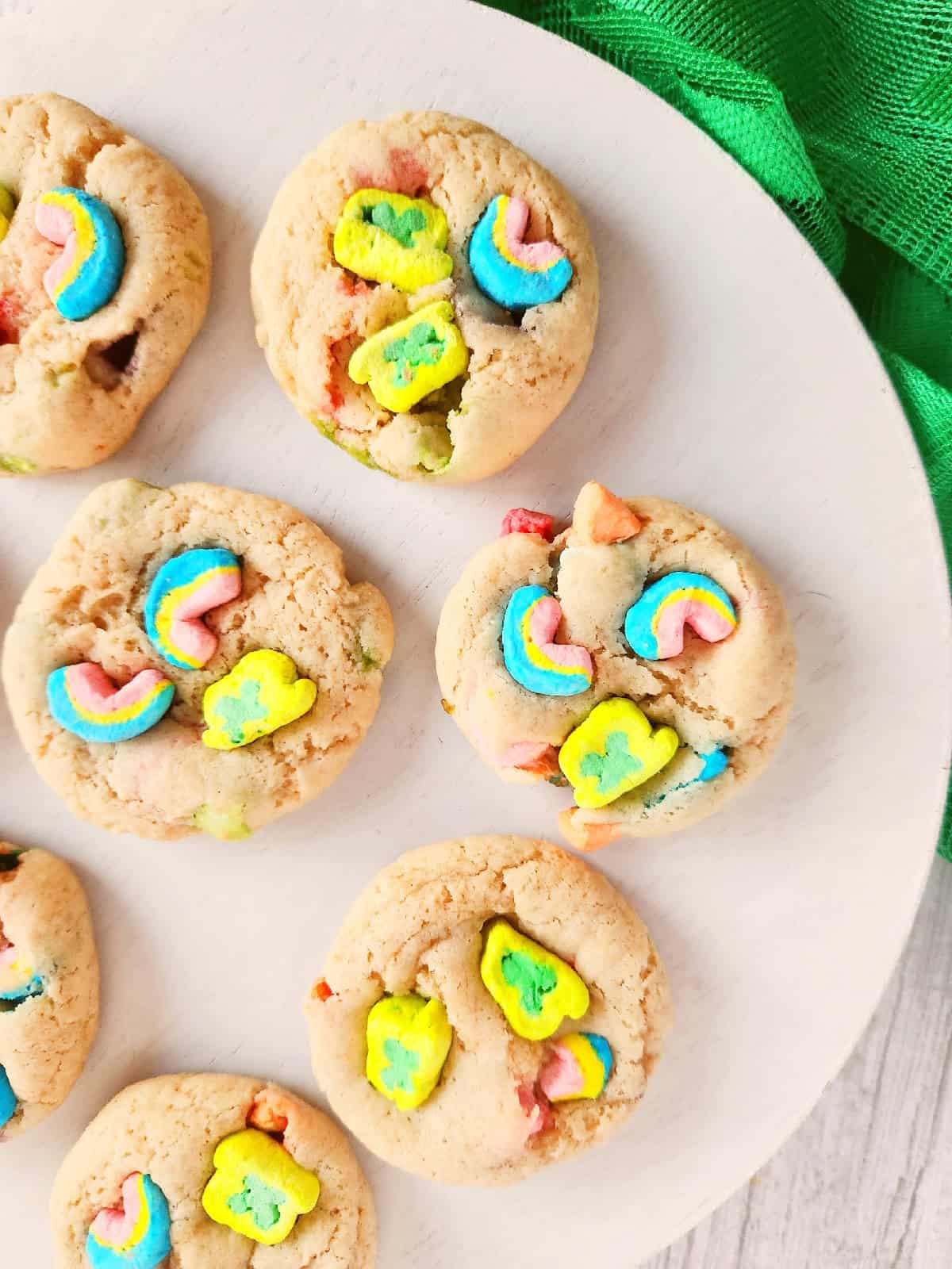 Inside view of a Lucky Charms cookie showing soft crumb and colorful cereal pieces.