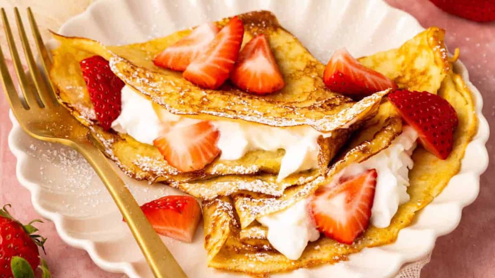 Almond flour crepes folded thin and tender with a lightly golden surface.