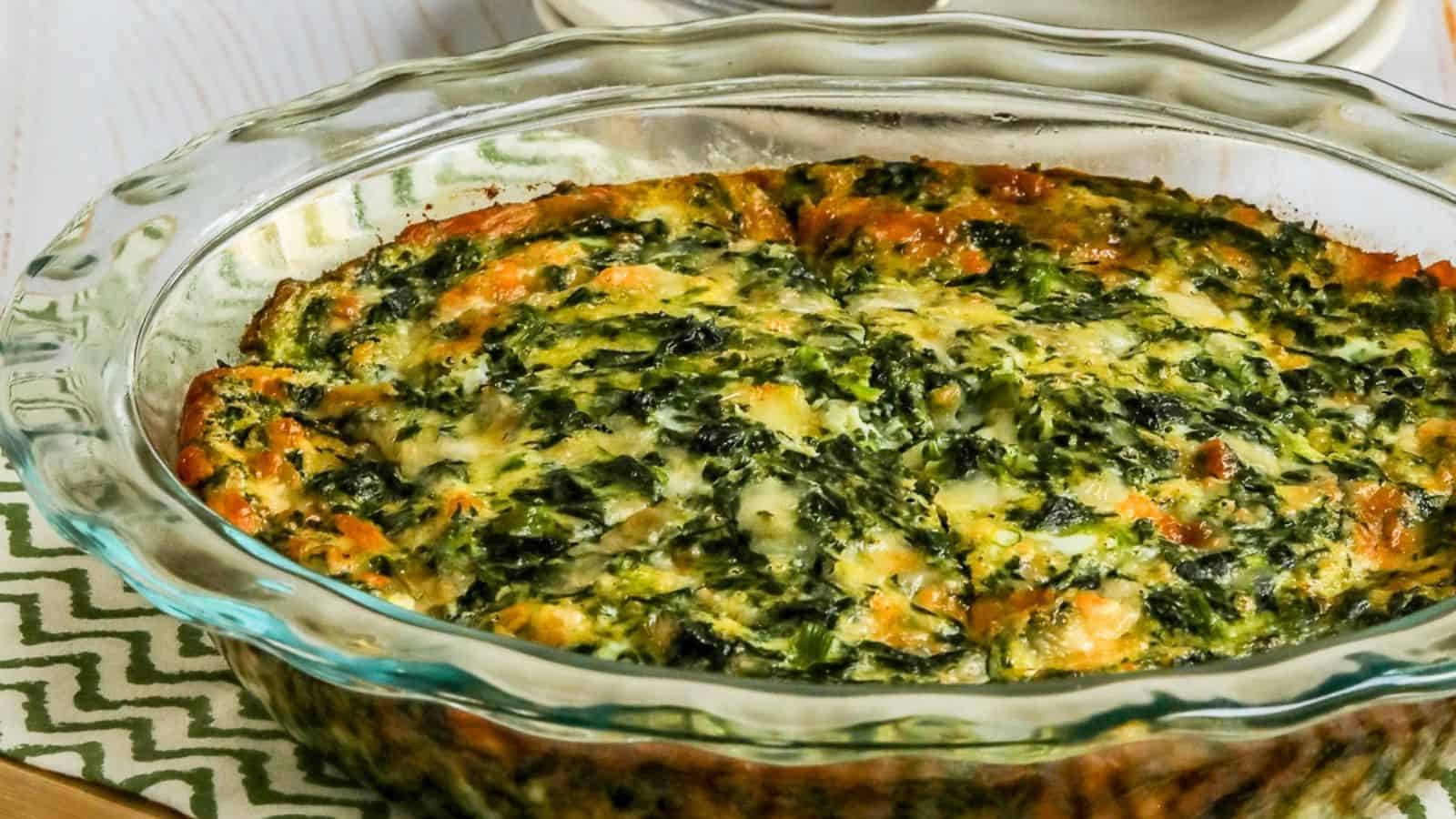 Crustless spinach quiche baked with eggs, spinach, and savory cheese filling.