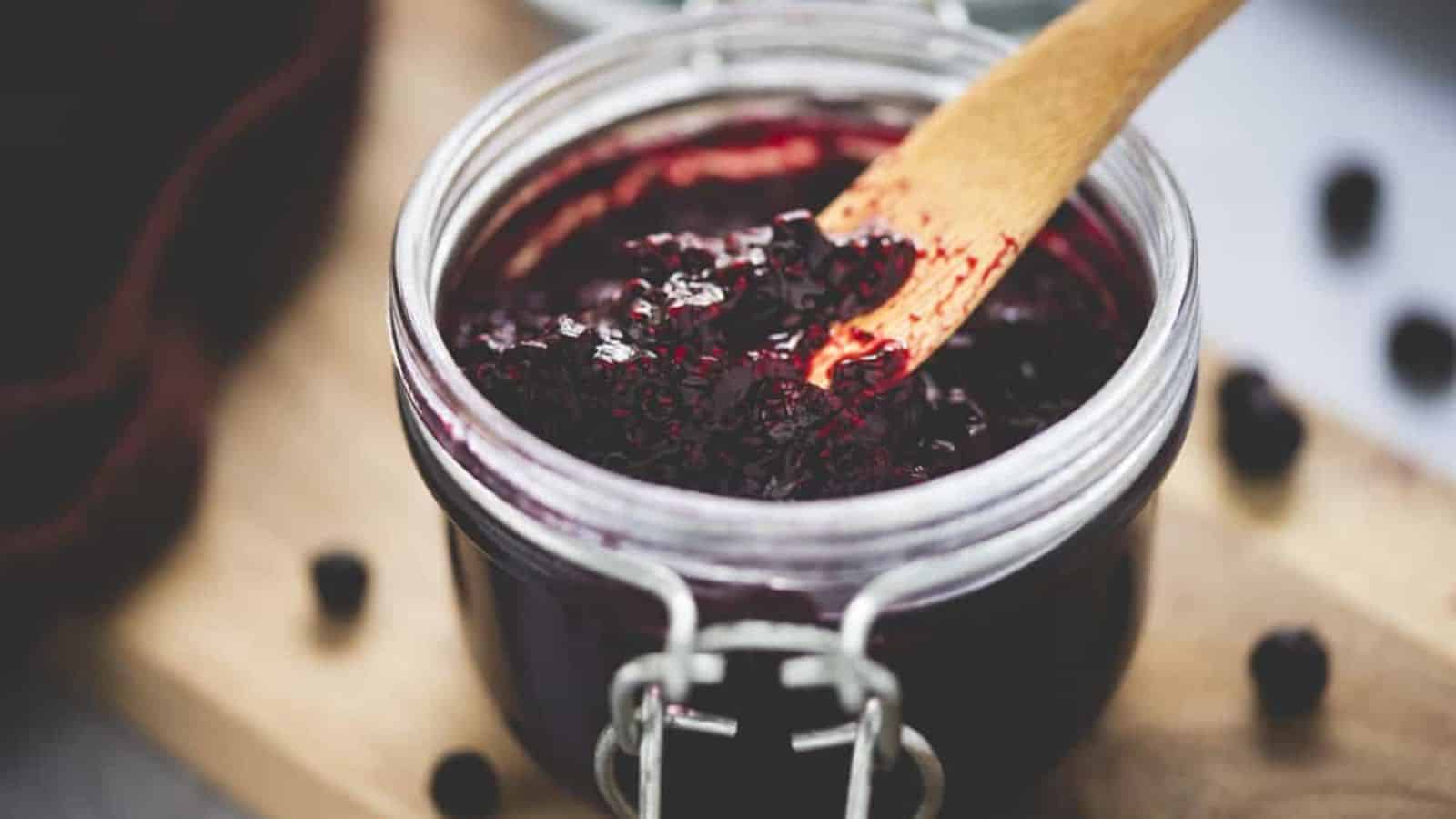Blueberry chia jam with thick texture and visible fruit pieces.