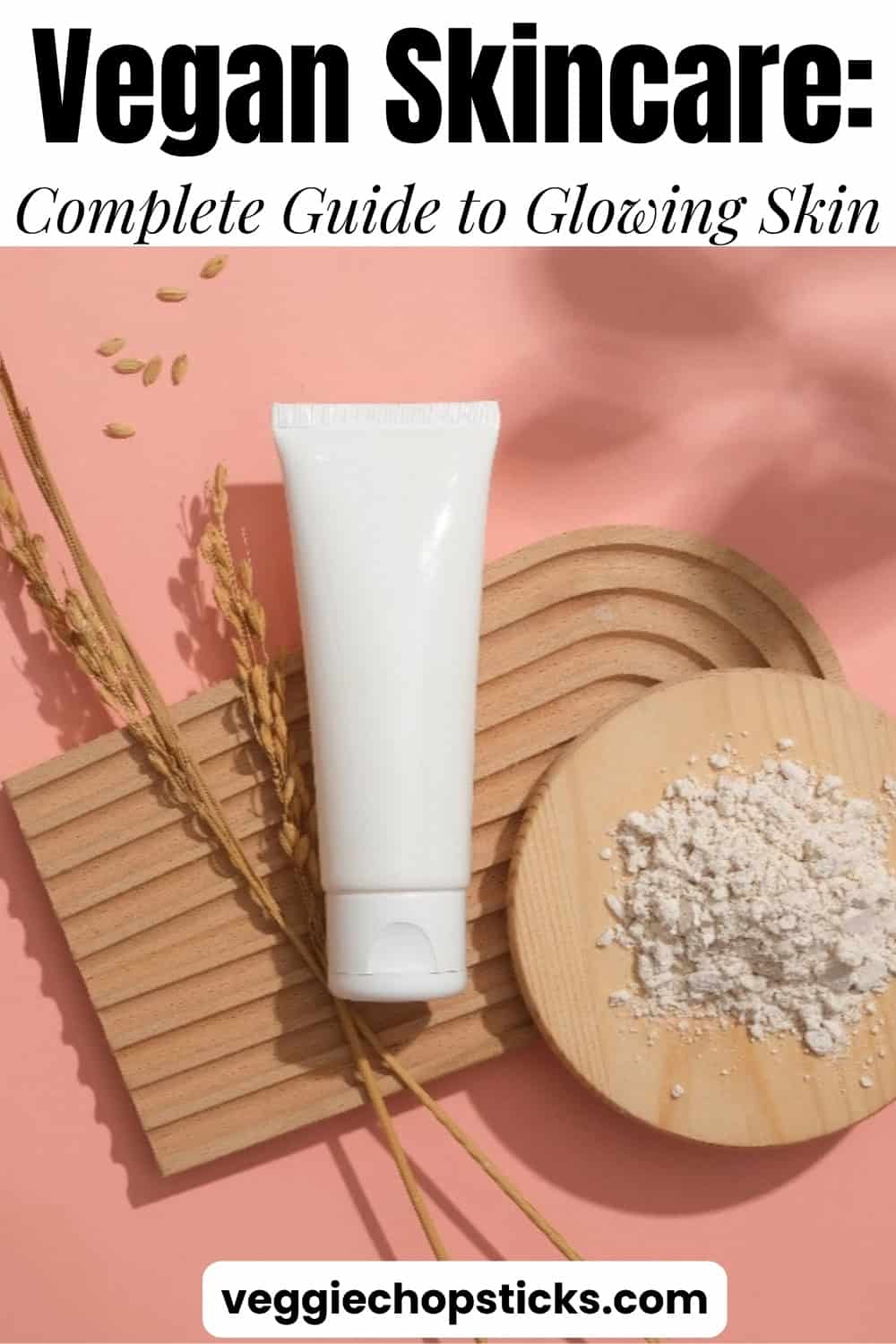 Vegan skincare guide with natural ingredients and minimal packaging on a soft pink background.