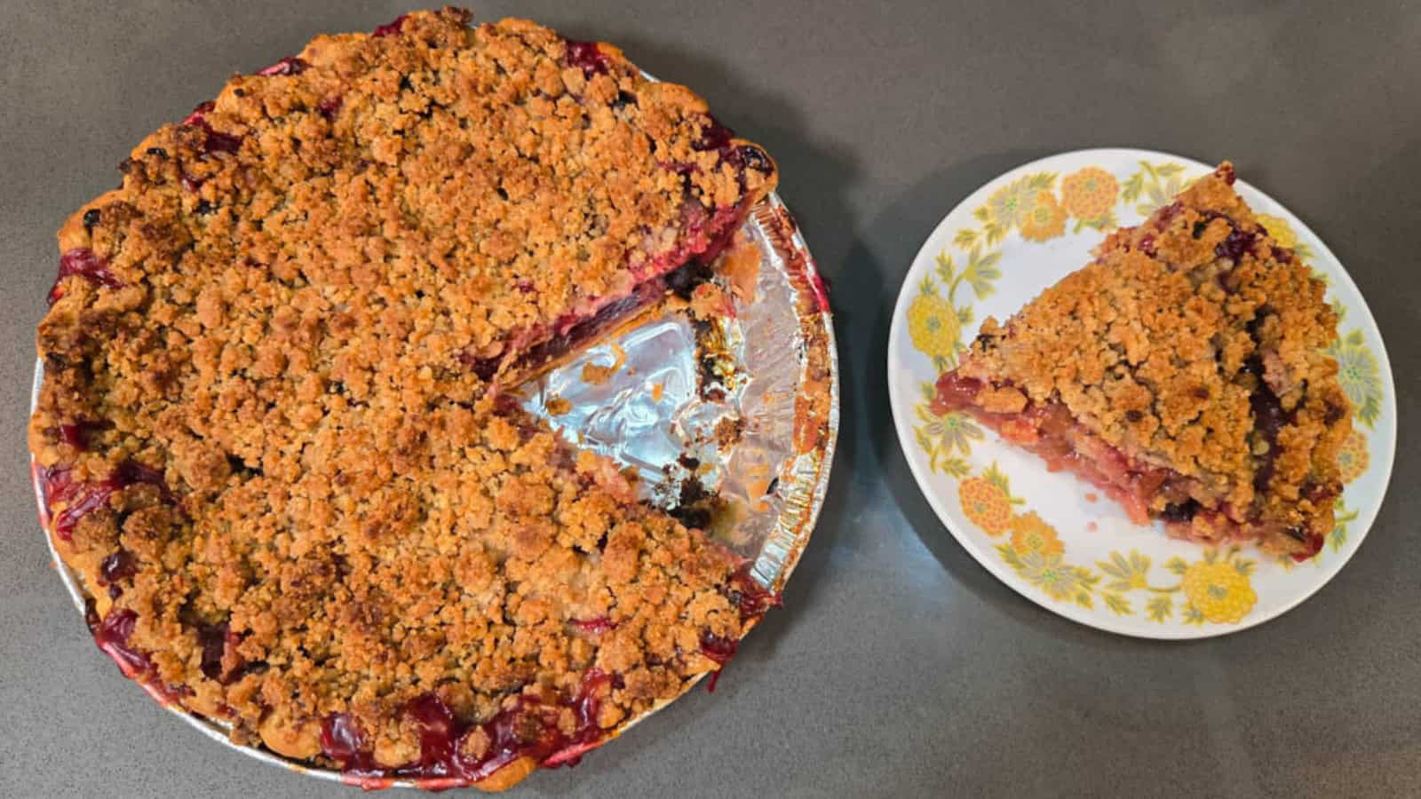 Pie filled with cherries and rhubarb in a flaky crust.
