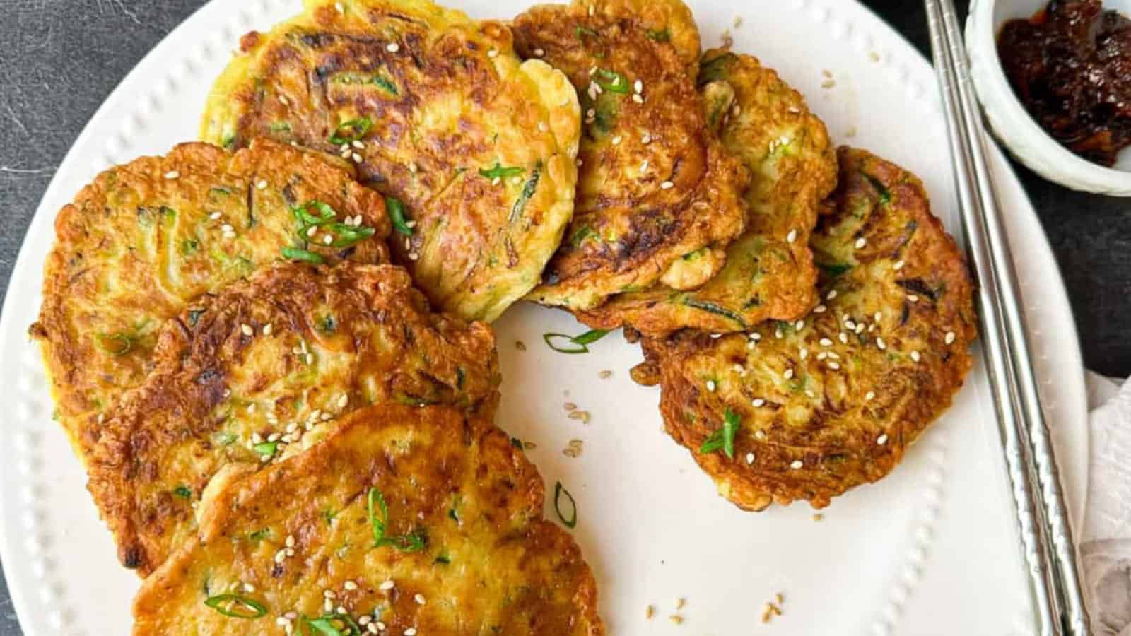 Crispy Chinese zucchini pancakes on a plate.