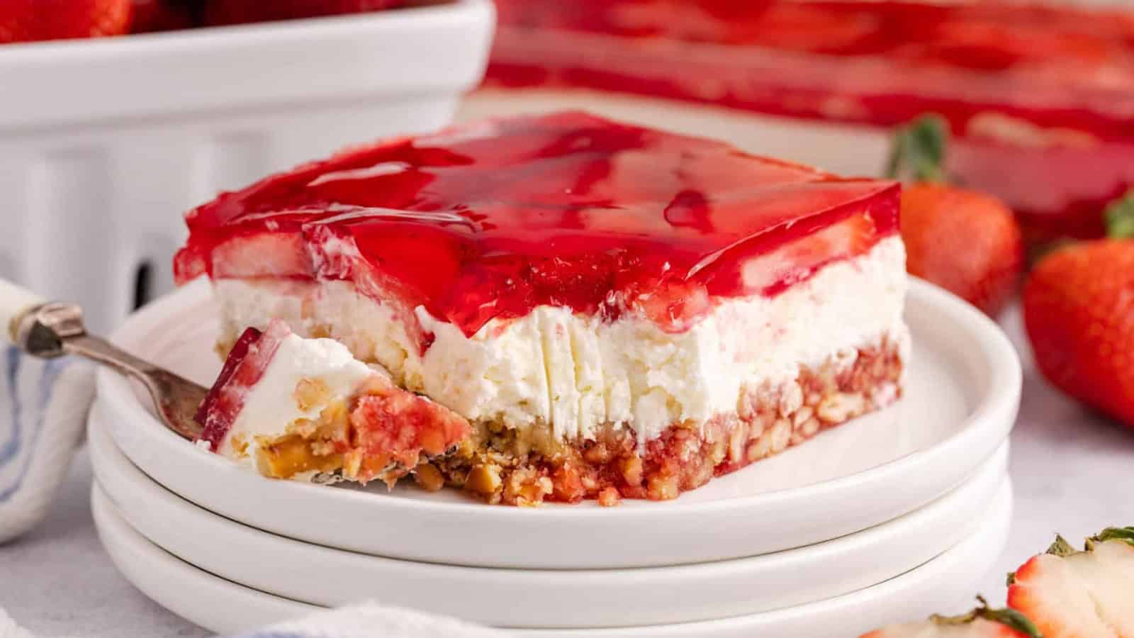 Strawberry pretzel salad layered with creamy filling and crunchy pretzel crust.