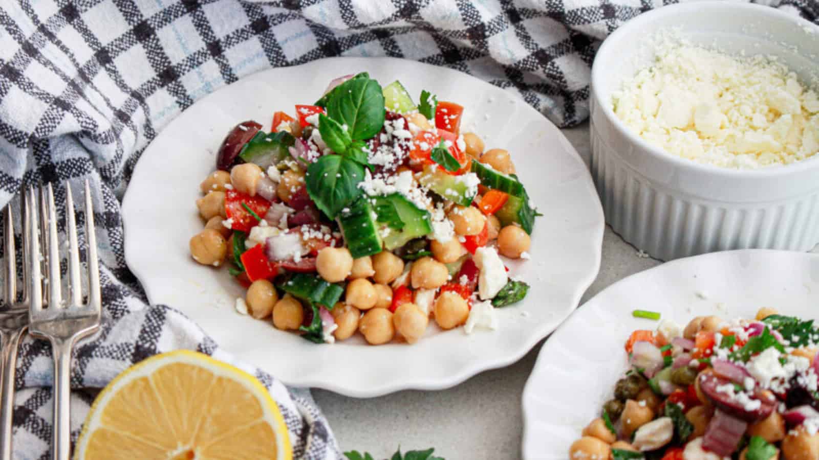 Chickpea salad mixed with vegetables and light dressing.