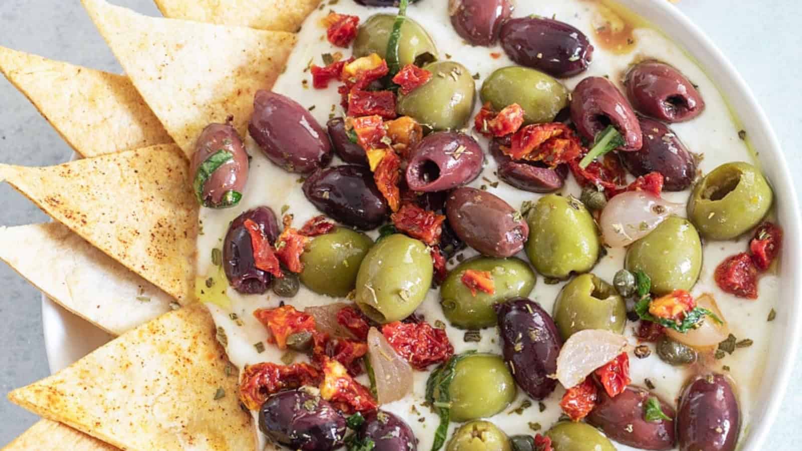 Olive salad tossed with olives, vegetables, and tangy dressing.