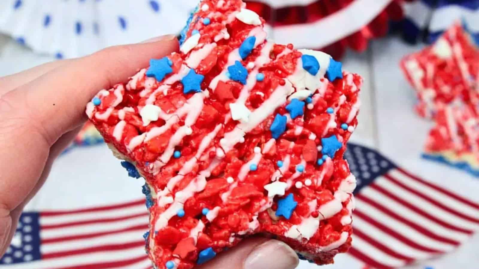 Rice Krispie treats decorated with red, white, and blue toppings.