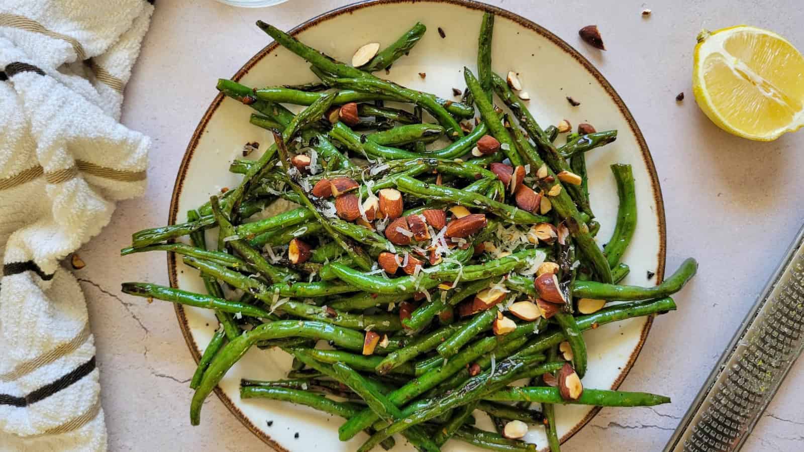 Grilled green beans cooked with light seasoning and charred edges.