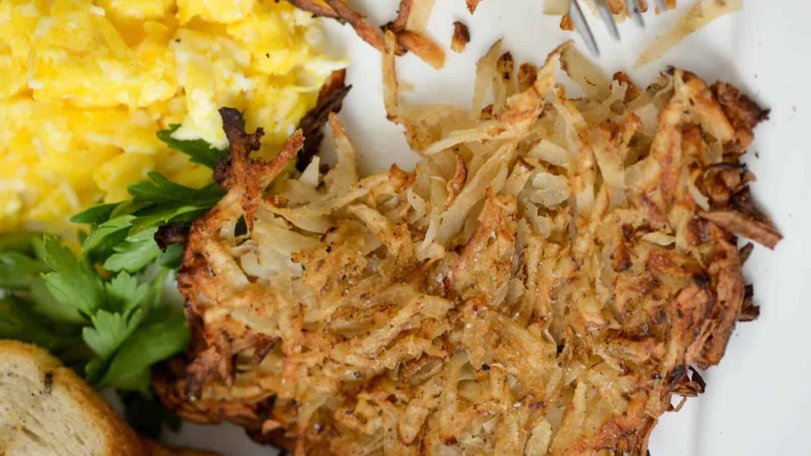 Hash browns grilled until crispy with golden edges.