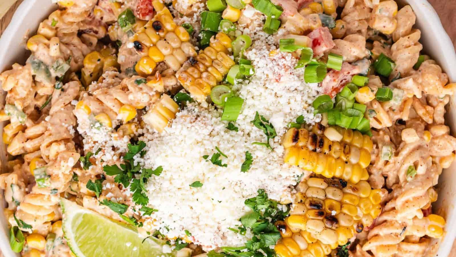 Pasta salad mixed with street corn flavors and creamy sauce.