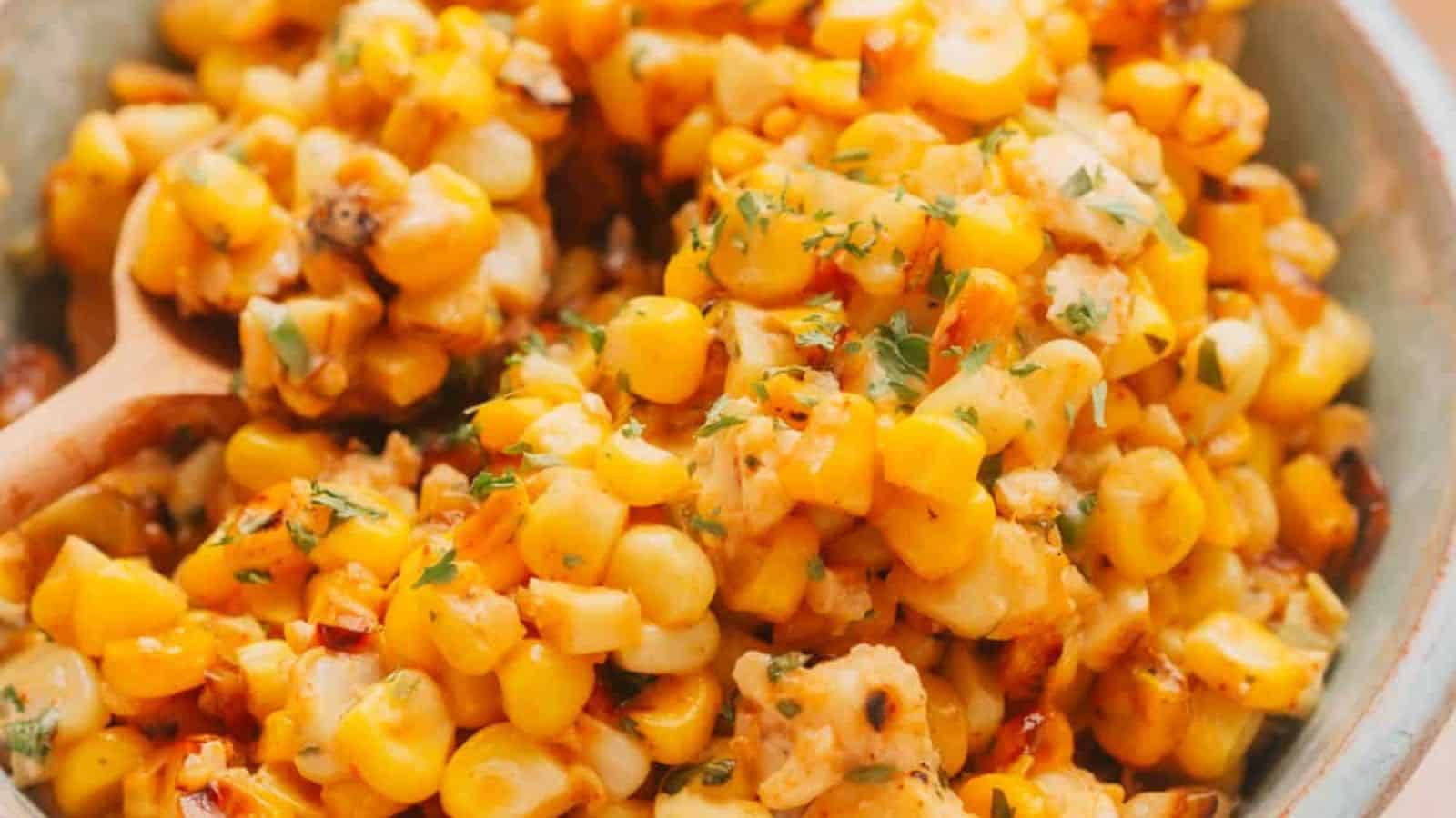 Street corn salad mixed with roasted corn and creamy seasoned dressing.