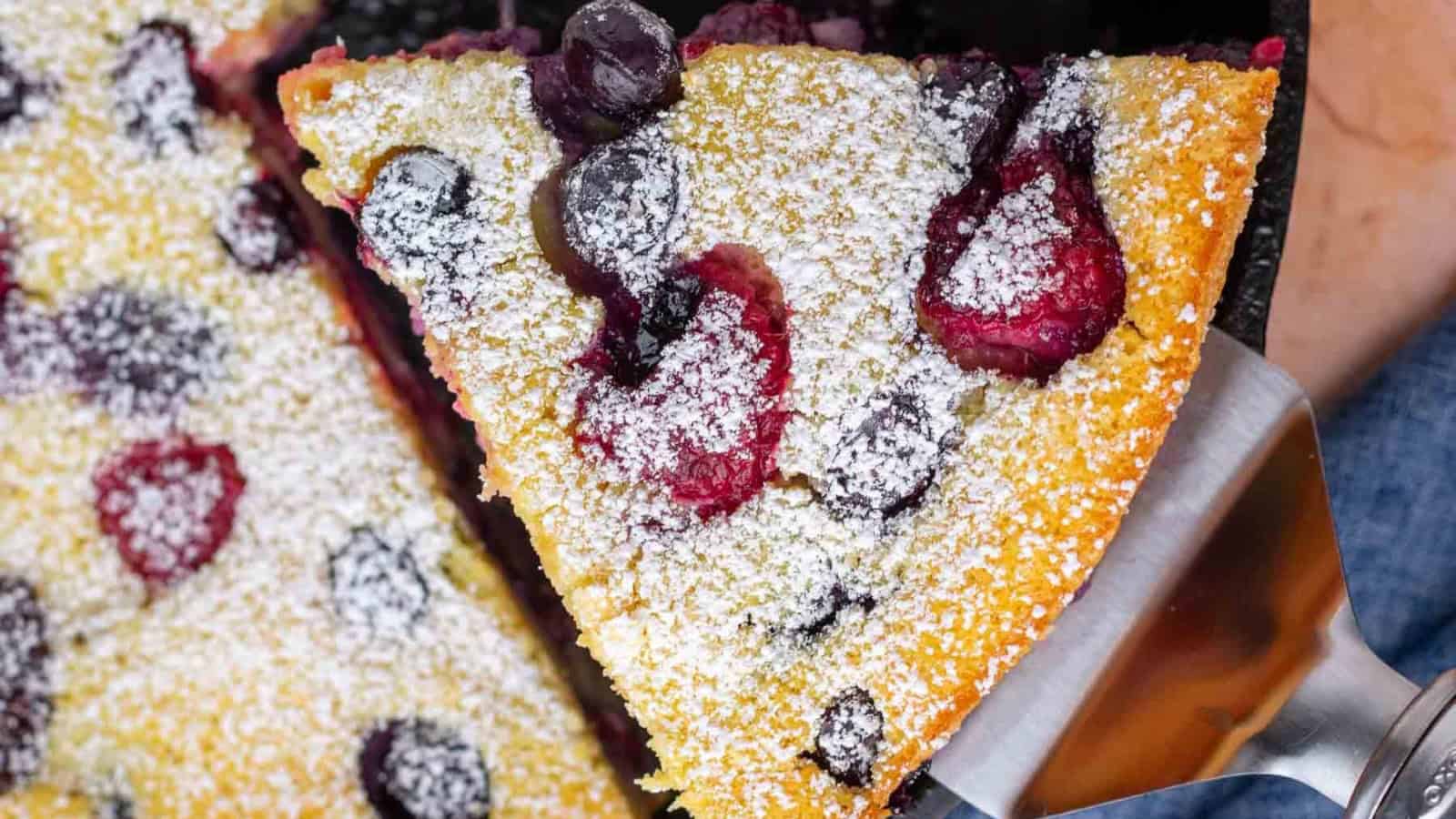 Berry clafoutis baked with mixed berries and soft custard texture.