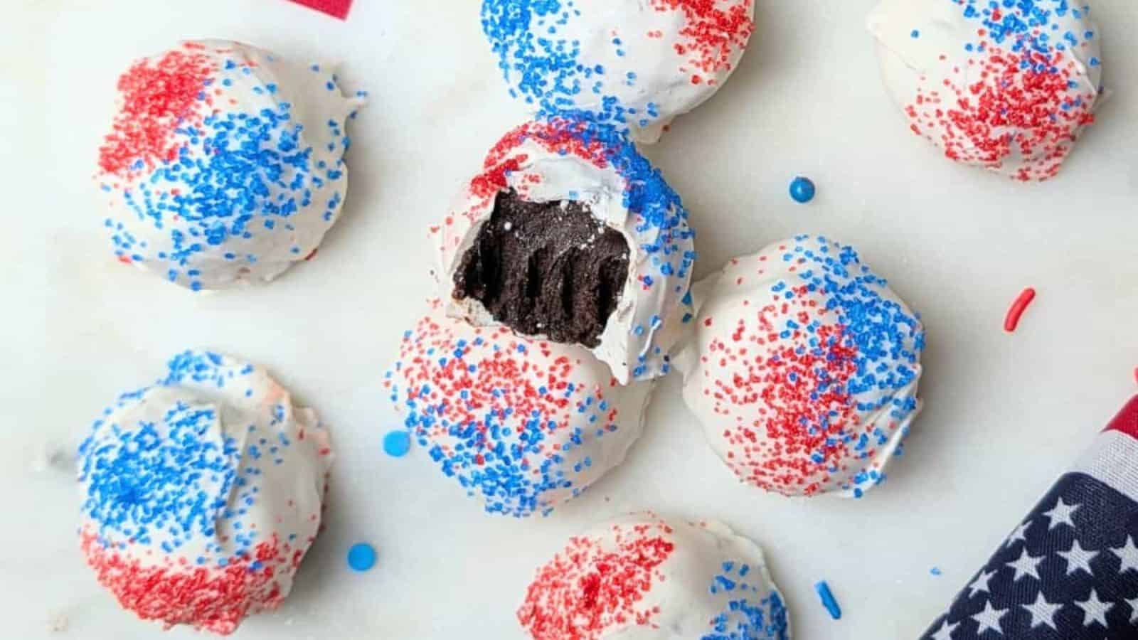 Oreo cream cheese balls coated in chocolate with a smooth center.