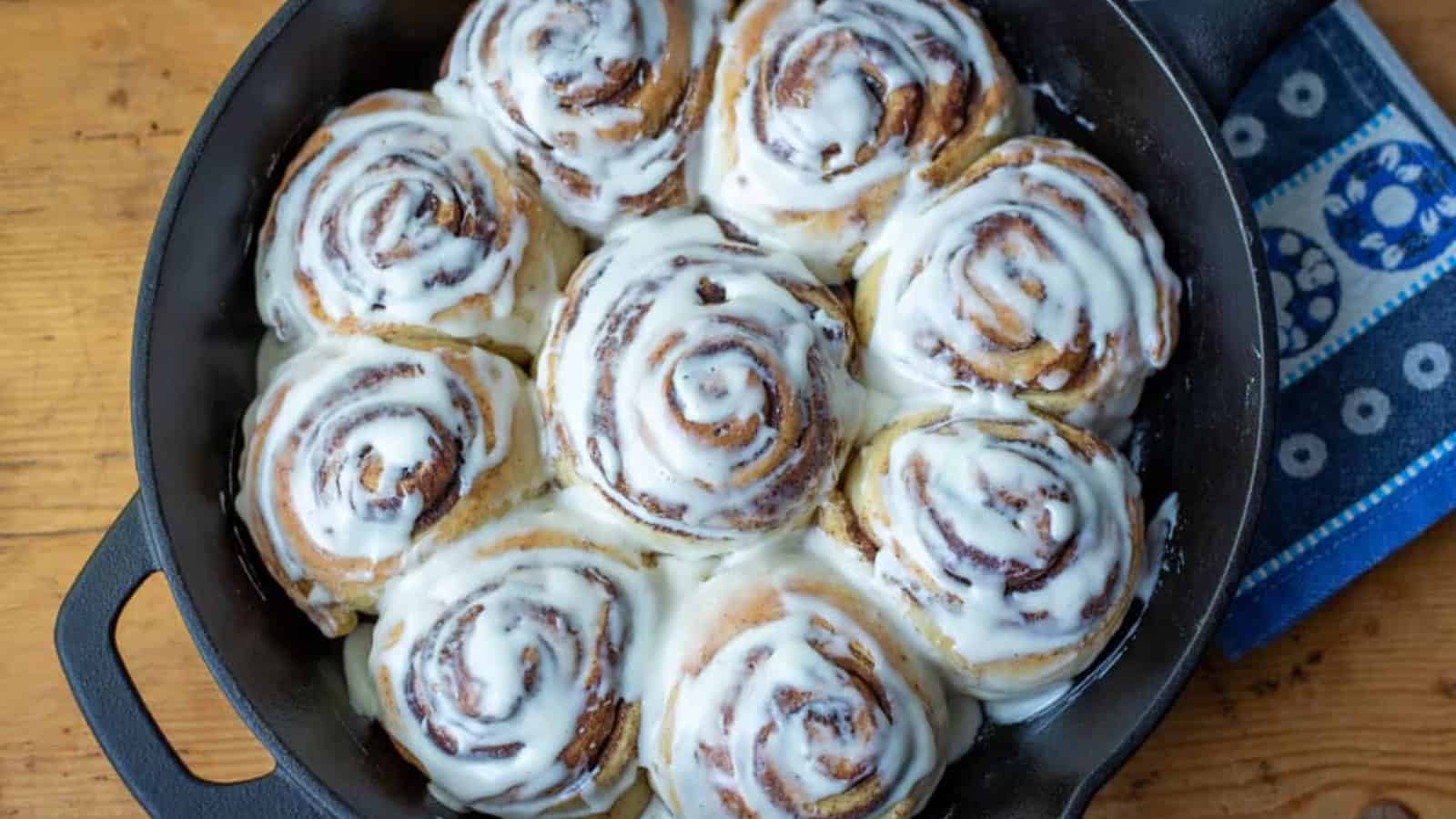 Cinnamon rolls baked soft with swirls of cinnamon and icing.