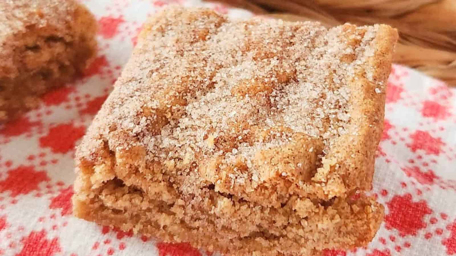 Churros bars baked with cinnamon sugar topping and soft layers.