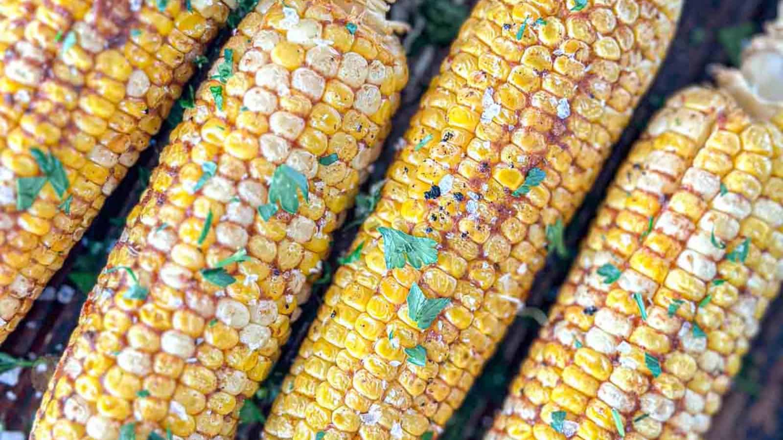 Corn on the cob smoked with buttery, smoky flavor and charred kernels.