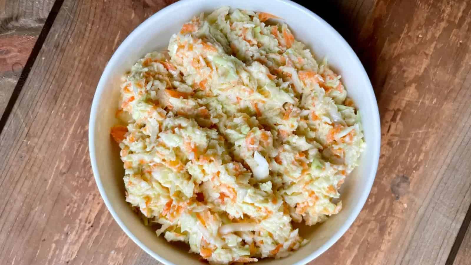 Vegan coleslaw made with shredded cabbage and tangy dressing.
