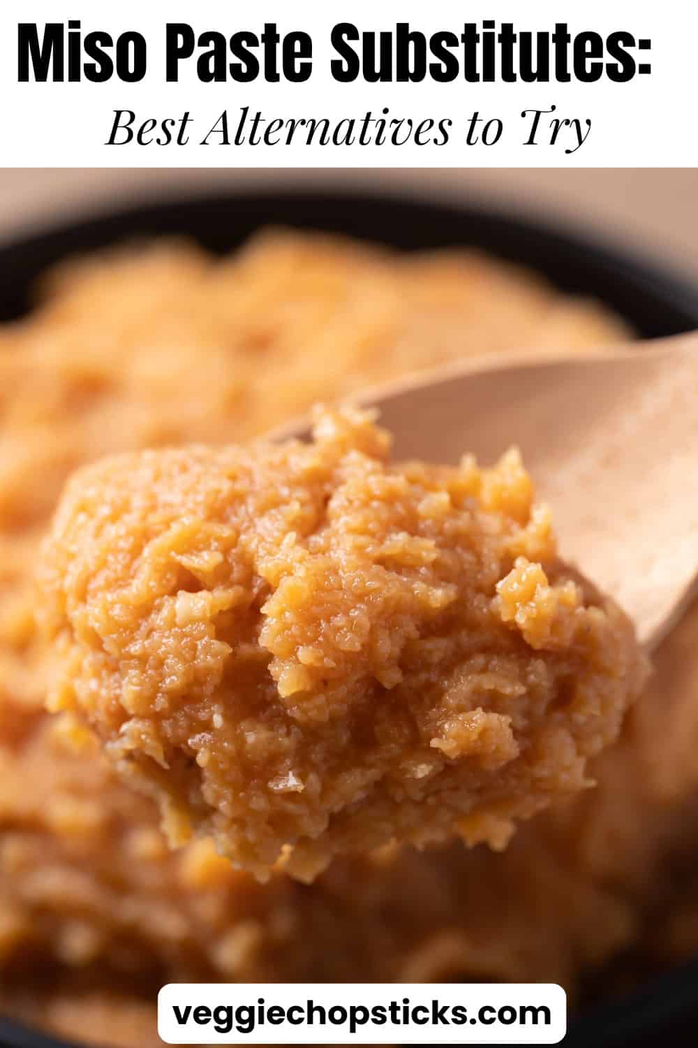 Close-up of a spoonful of miso paste showing its smooth texture.