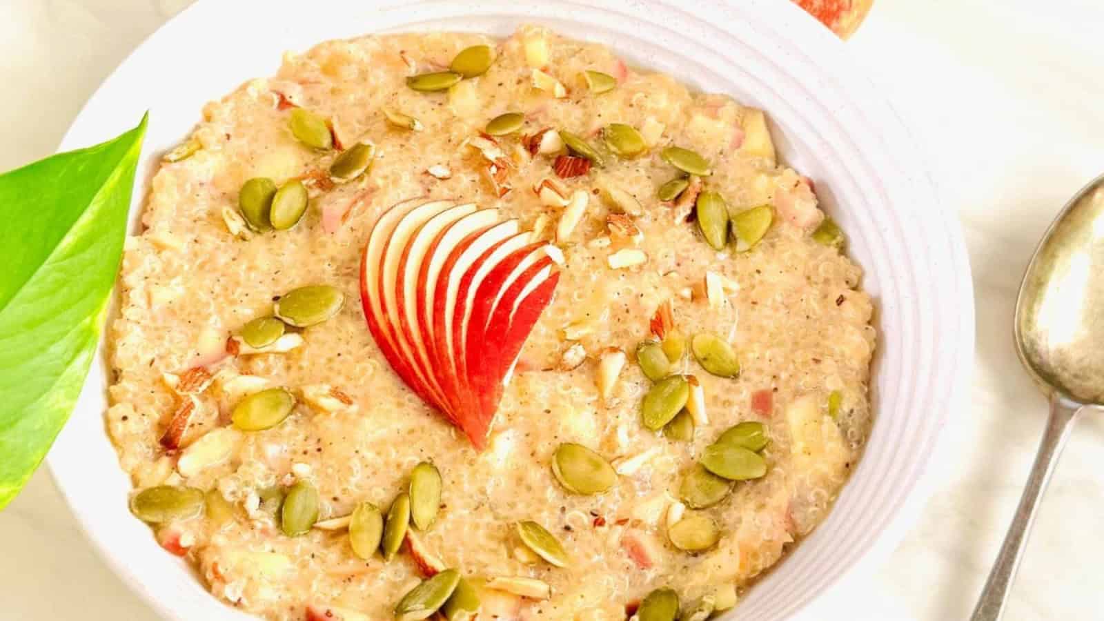 Warm quinoa porridge topped with tender apples and cinnamon.