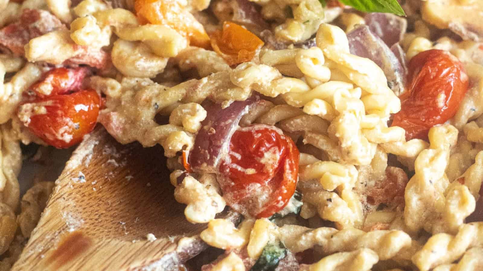 Creamy Boursin pasta tossed with cherry tomatoes and fresh herbs.