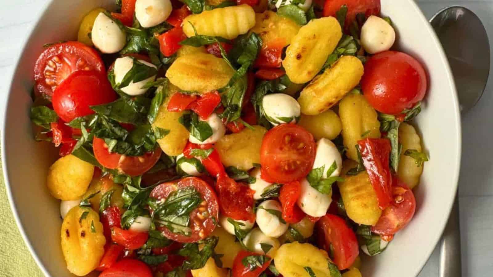 Cherry tomato Caprese salad with mozzarella, basil, and a light dressing.
