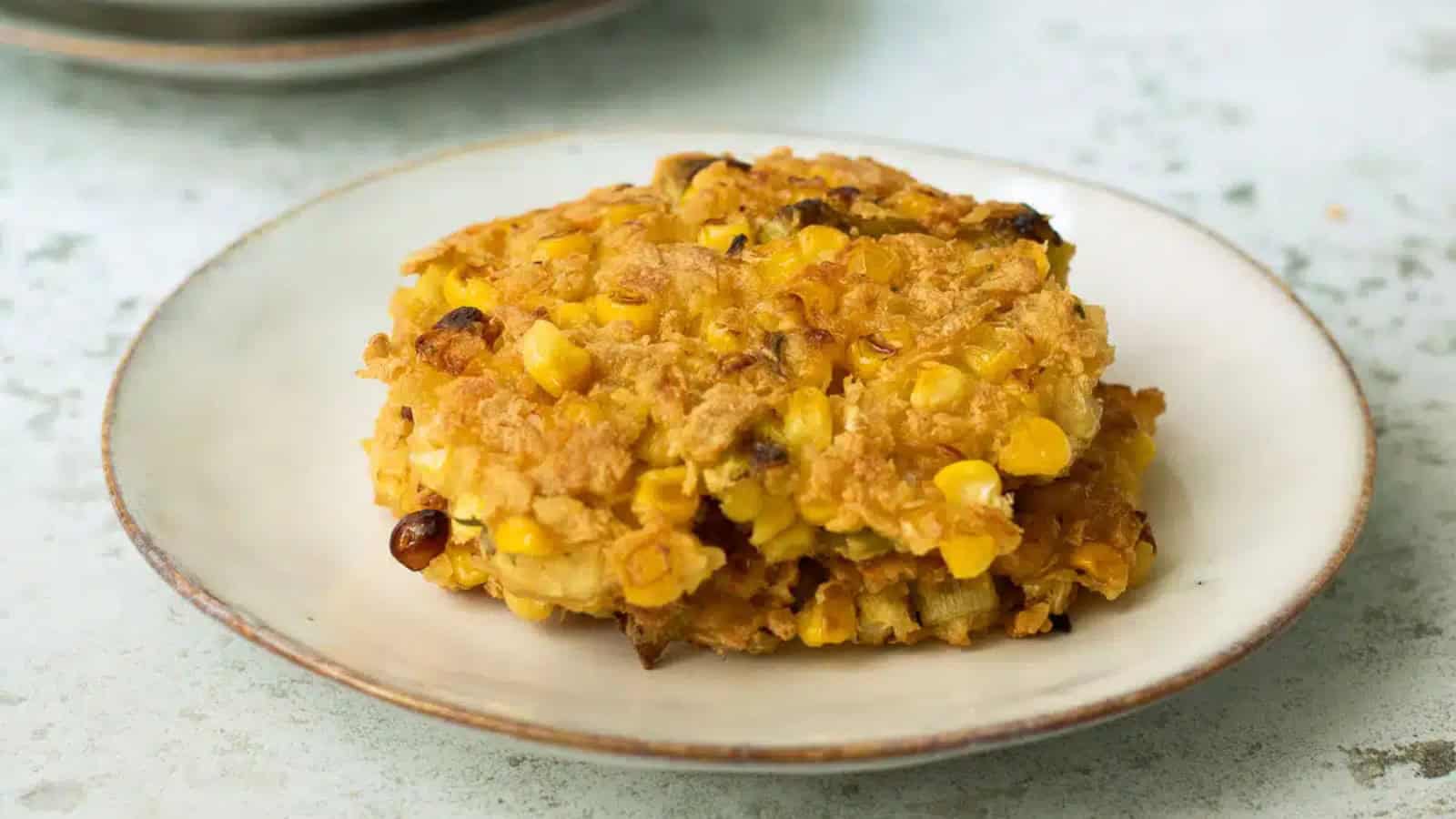 Crispy corn tofu fritters served with a golden crust.