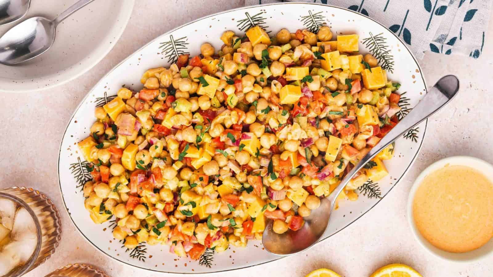 Buffalo chickpea salad tossed in spicy sauce with crisp vegetables.