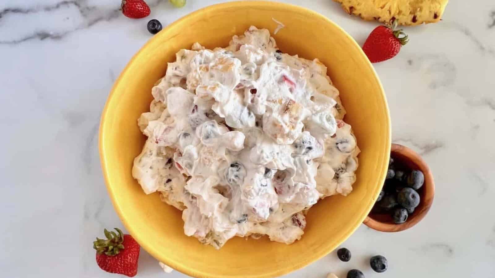 Colorful fruit salad tossed in a light and fluffy Cool Whip dressing.