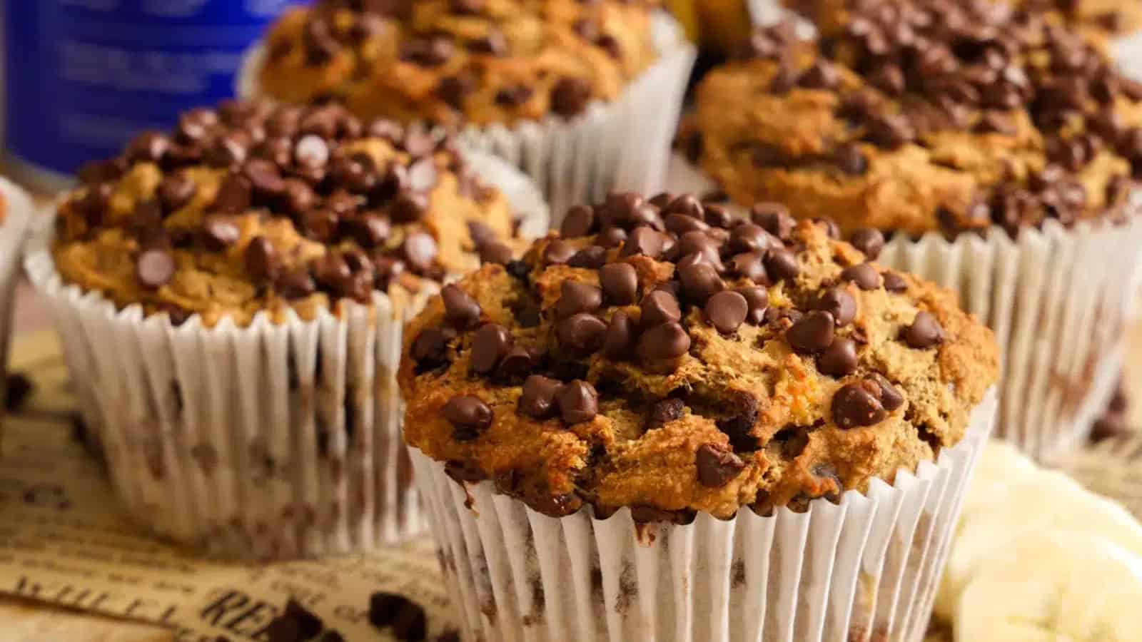 Soft banana protein muffins filled with chocolate chips.