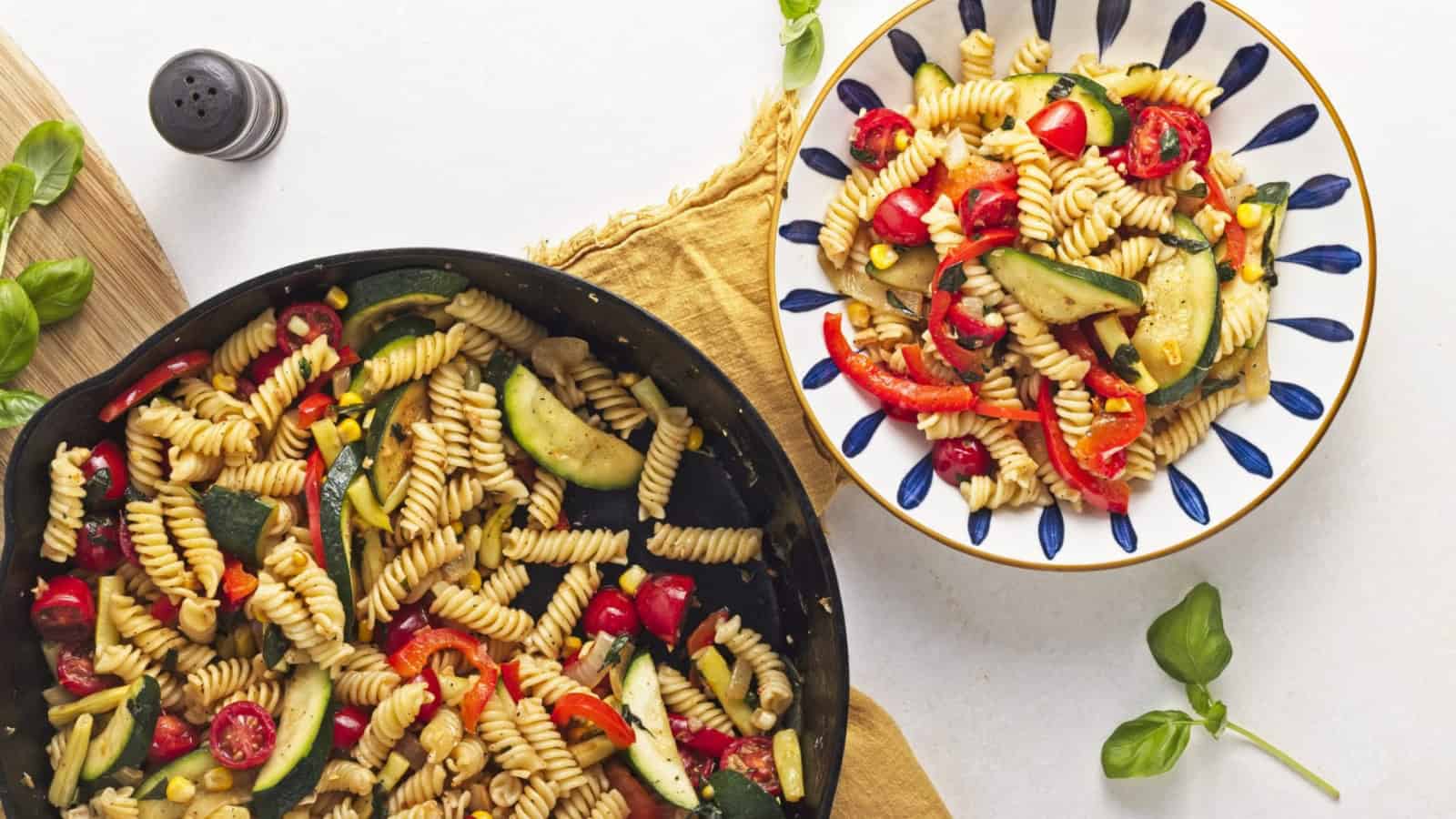 Pasta primavera loaded with colorful vegetables and fresh tomatoes.