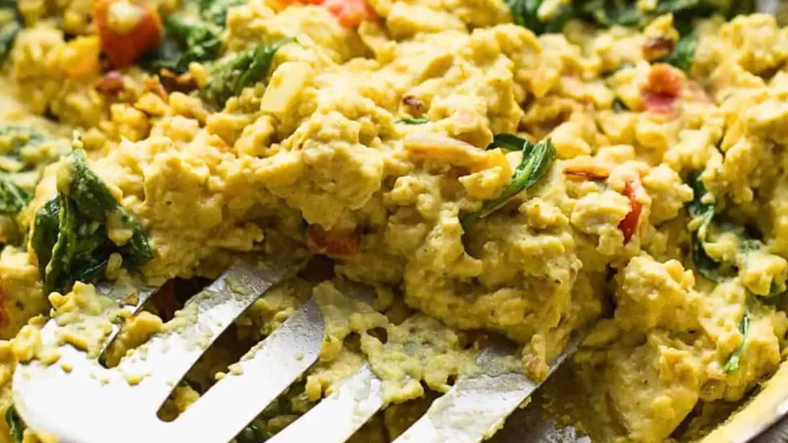 Fluffy tofu scramble with colorful vegetables and savory seasonings.
