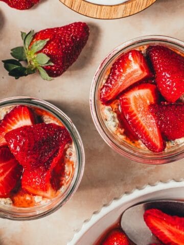 Overnight oats topped with juicy macerated strawberries.