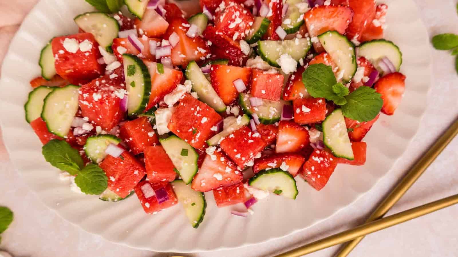 Refreshing watermelon salad with juicy fruit and savory toppings.