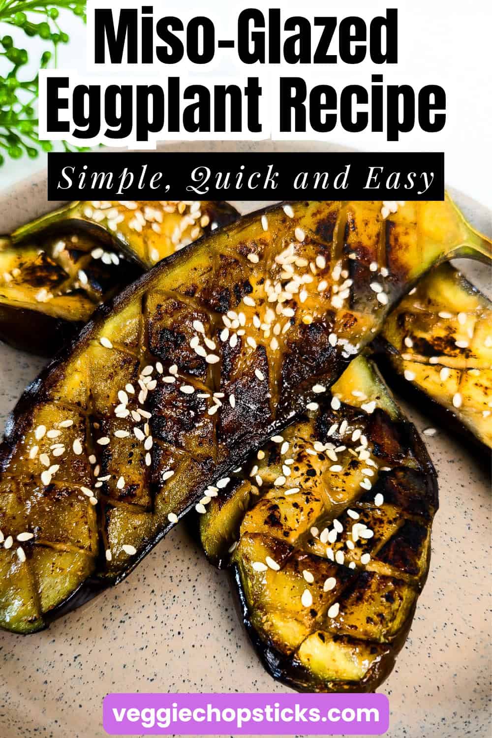 Caramelized miso glazed eggplant with sesame seeds, showing the tender roasted eggplant and golden-brown glaze.