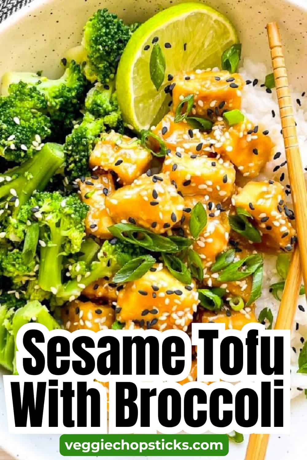 Sesame tofu with broccoli over rice topped with sesame seeds, green onions, and lime in an easy vegetarian dinner bowl.