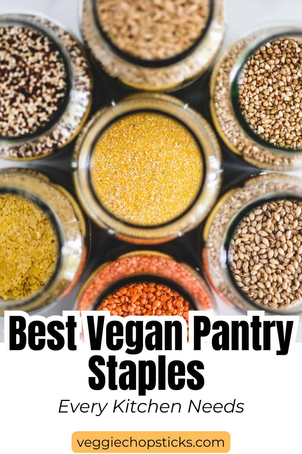 Assorted jars of grains, lentils, and pantry staples arranged overhead, showcasing essential ingredients for a vegan kitchen.