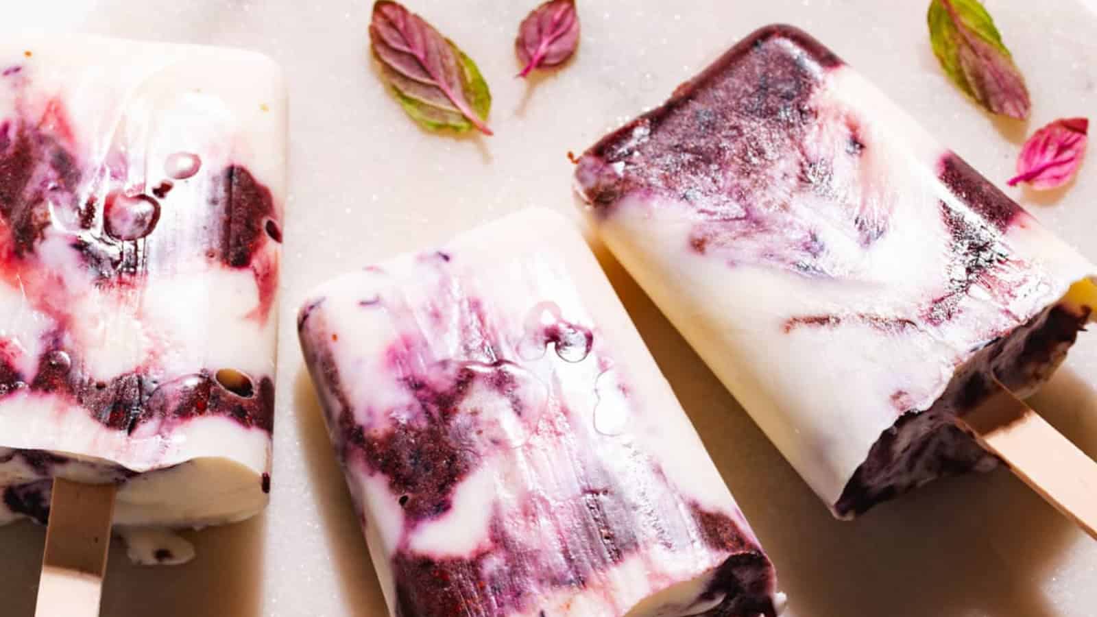 Homemade yogurt popsicles made with fresh fruit and yogurt.
