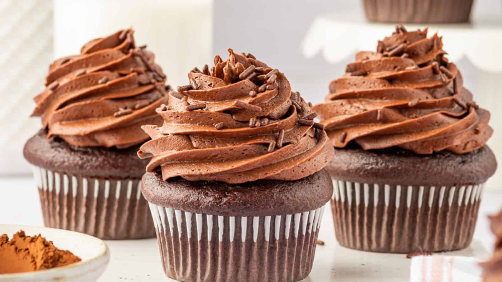 Decadent gluten-free chocolate cupcakes finished with creamy frosting.