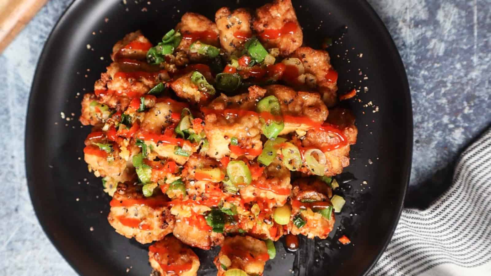 Crispy salt and pepper tofu cooked in the air fryer.