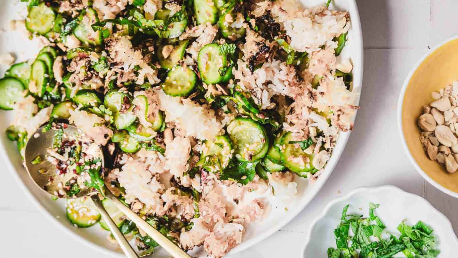 Crunchy cucumber salad tossed with crispy rice and fresh herbs.