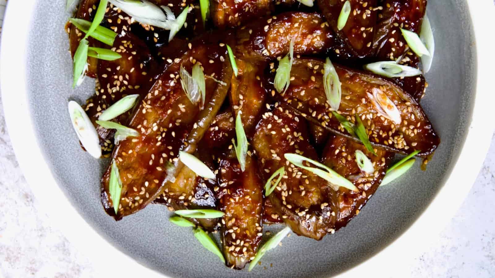 Roasted eggplant coated in a sweet and spicy gochujang glaze.
