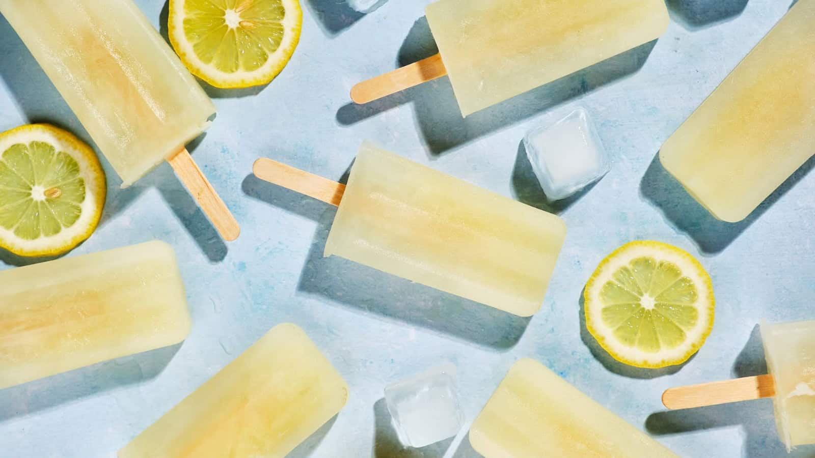 Tangy lemonade popsicles frozen into a refreshing summer snack.