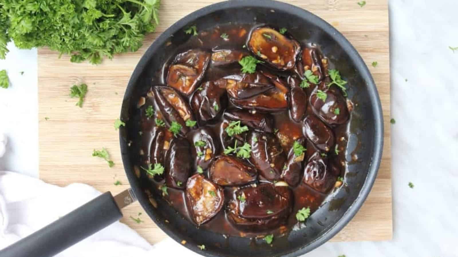 Roasted baby eggplants drizzled with a savory stir-fry sauce.