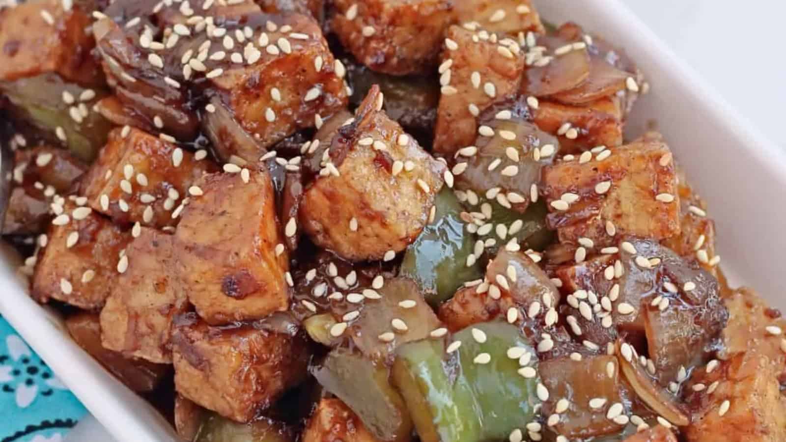 Crispy fried tofu coated in a spicy and flavorful sauce.